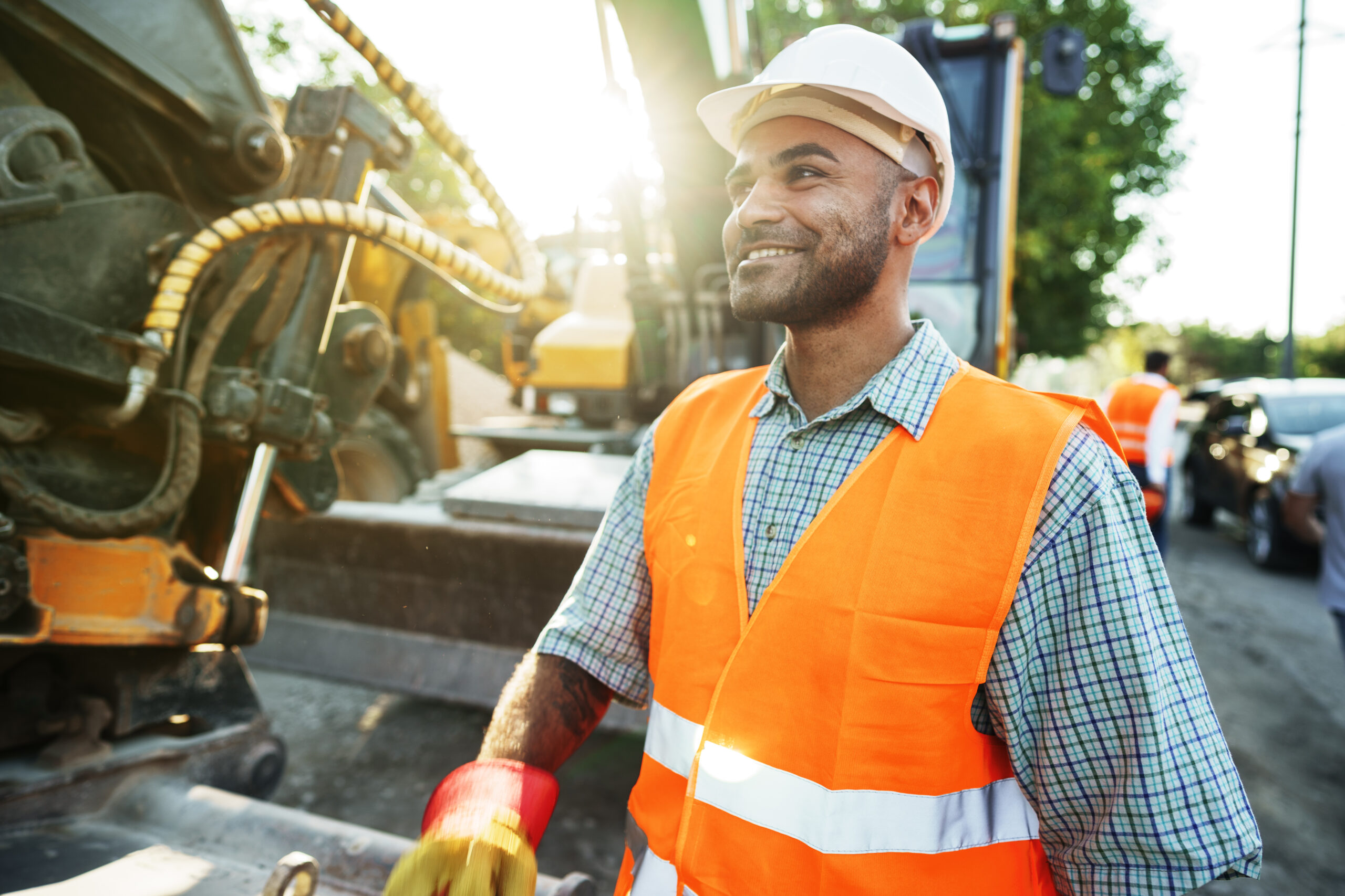 Portrait of young construction engineer wearing hardhat